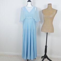 Union Made In Usa Baby Blue Vintage Sleeveless With Long Sheer Cape Pleated Retro 60's 70's Boho Princess Glamour Dress No Size Tag. Please See Measurementsmannequin Is Size 6. Pit To Pit: 18" Top Of Shoulder To Hem: 53" Waist: 16" Hip: 29" Material: Spandex Blend Dreamy Retro Vintage Hollywood Princess Queen Classic Movie Star Goddess Glamour Witch Television Evening Wear Wedding Black Tie Red Carpet Hippie Summer Spring Party Bewitched Mary Tyler Moore Blue Vintage Dress For Summer Party, Blue Vintage Summer Party Dress, Light Blue Sleeveless Vintage Dress, Blue Retro Spring Dresses, Retro Blue Spring Dress, Light Blue Retro Summer Dress, Retro Light Blue Summer Dress, Blue Vintage Dress For Spring Party, Spring Vintage Blue Dress For Party