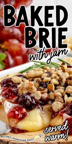 baked brie with jam served warm on a cutting board next to grapes and nuts