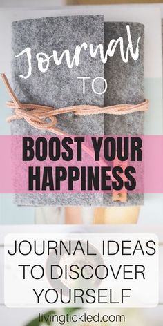 a book with the title, journal to your happiness