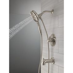 the shower head and handset are connected to the faucet