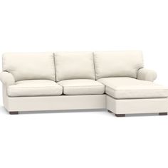 a white couch with a footstool on the bottom and one end facing it