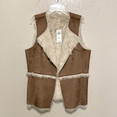 Hollister Faux Suede Vest Size Medium. Please See Pictures For Details And Measurements. Brown Faux Fur Outerwear For Spring, Spring Brown Faux Fur Outerwear, Cream Outerwear With Faux Fur Lining For Spring, Faux Suede Vest, Hollister Jackets, Suede Vest, See Pictures, Faux Suede, Hollister