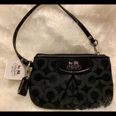 This Brand New, With Tags, Coach Wristlet Is The Perfect Size Wallet For When You Don’t Want To Carry A Purse. Black Handheld Wallet With Zipper Closure, Black Handheld Wallets With Zipper Closure, Black Handheld Clutch With Zipper Closure, Black Pouch Wristlet For Everyday Use, Black Zipper Pouch Wristlet For Travel, Black Wallet With Wrist Strap For Gift, Black Clutch Wristlet For Gift, Black Wallet With Wrist Strap As Gift, Elegant Black Rectangular Wristlet