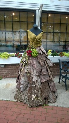 a dress made out of a tree stump