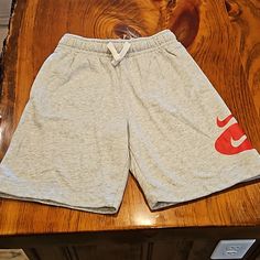 Nwot Youth Medium. See Measurements In Pics! Light Gray And Red. Pockets And Tie String At Waist. Lots Of Boys Shorts In My Closet. Bundle And Save Lots! Smoke Free Home Nike Cotton Shorts For Playwear, Boys Nike Shorts, Cloth Shorts, Pink Activewear, Black Athletic Shorts, Nike Bottoms, Boys Shorts, Nikes Girl, Nike Running Shorts