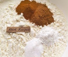 spices and flour in a white bowl on a table