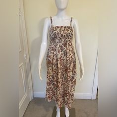 This Has Never Been Worn, I Took Off The Tag But Never Wore It. It’s In Perfect Condition. Beige Sundress With Smocked Back For Vacation, Beige Midi Length Smocked Sundress, Fitted Beige Smocked Dress For Beach, Cotton Smocked Dress With Floral Print For Beach, Beige Sundress Smocked Dress For Vacation, Beige Casual Smocked Dress For Vacation, Casual Beige Smocked Dress For Vacation, Fitted Brown Sundress With Floral Print, Vacation Brown Floral Print Sundress