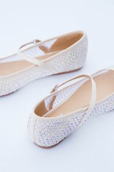 Step into whimsical elegance with the Geneva Jewel Mesh Ballet Flat. Made with delicate mesh material and adorned with sparkling jewels, these flats are sure to make a statement. The square toe adds a modern touch to this classic ballet flat. General Info: Ballet Flat Mesh Material Jeweled Square Toe Man Made Imported Mesh Flats, Bridal Flats, Wedding Flats, Mesh Shoes, Vintage Havana, Mode Online, Mesh Material, Ballet Flat, Geneva