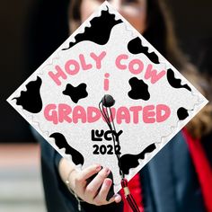 Looking for a unique graduation cap topper on the big day? Check out our design for Personalized Holy Cow I Graduated Printed Grad Cap Topper. It's the perfect choice for you. Or it could be a special gift for your loved one who prepares for the graduation ceremony. This graduation cap topper is digitally hand-drawn (NOT PAINTED), whether you're in a time crunch, or you want something easy and affordable for your special day! It's easy to apply to your graduation cap up to minutes before graduat Morgan Wallen Grad Cap, College Grad Hats Cap Decorations, Esthetics Graduation Cap, Cow Print Cap And Gown, Boy Cap Decoration Graduation, Marketing Graduation Cap, Easy Cap Decorations Graduation, Holy Cow I Graduated Cap, Cow Print Graduation Cap