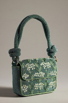 Find ANTHROPOLOGIE Fiona Beaded Bag on Editorialist. The By Anthropologie Fiona Beaded Bag features intricate beadwork and a magnetic closure. The bag is constructed with cotton, acrylic, and glass beads. It has top handles that are knotted for a unique look. Green Fits, Candles For Sale, Beaded Bag, Pretty Bags, Beaded Purses, Candle Accessories, Beaded Bags, Cute Bags, Acrylic Beads