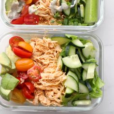 two plastic containers filled with different types of vegetables and meats on top of each other