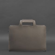 An original bag for a laptop and documents will emphasize the status and style of the owner.The bag is made of high-quality genuine leather. Strong textile lining inside. All seams are sewn by hand with strong threads.The bag has one large compartment and a pocket for a laptop with a strap to fix the device. There are also two internal pockets for small items.It is convenient to carry the accessory in the hand or on the shoulder. A long leather shoulder strap is included.Such a bag will be a gre Modern Satchel With Laptop Sleeve, Modern Satchel Tote With Laptop Sleeve, Modern Top Handle Shoulder Bag With Laptop Sleeve, Modern Top Handle Satchel With Laptop Sleeve, Modern Bag With Laptop Sleeve And Top Handle, Office Satchel With Laptop Sleeve And Top Handle, Top Handle Briefcase With Luggage Sleeve, Everyday Laptop Bag With Sleeve And Top Handle, Everyday Laptop Bag With Top Handle And Laptop Sleeve