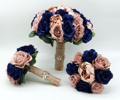 the bridal bouquets are made up of pink and blue flowers