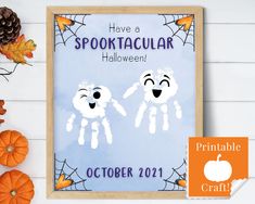 a printable halloween card with two ghost hands and pumpkins in the background that says have a spooktacular halloween