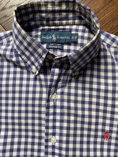 For Sale is a Vintage Polo Ralph Lauren blue & white gingham check short sleeve button down Tagged size is Small For more accurate measurements, Like pit to pit, sleeve length, or length on back etc, see photo's. Shipped safely and securely See my Positive feedback ! Vintage Polo Ralph Lauren, Ralph Lauren Blue, Gingham Check, Vintage Polo, Mens Oxfords, Positive Feedback, Custom Fit, Polo Ralph, Gingham