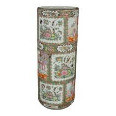 a tall vase with many different designs on it