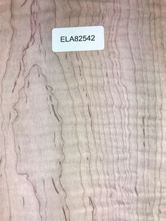 a close up view of the wood grains on this table with a label that says ela025422