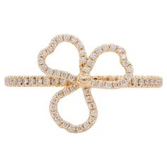 We are pleased to offer this Authentic Tiffany & Co. 18k Rose Gold & Diamond Open Paper Flower Ring. This beautiful ring features the Tiffany & Co "paper flower" open design set with an estimated 0.40ctw F-G/VS1-VS2 round brilliant cut diamonds prong set in 18k Rose gold extending 3/4 of the way around the ring. It is a size 6 US and the band measures 1.5mm wide with the flower measuring 11.75mm wide. The ring is in excellent condition with very few signs of wear and was recently polished by our Luxury Yellow Gold Flower Diamond Ring, Formal Yellow Gold Diamond Ring With Flower Shape, Formal Yellow Gold Flower-shaped Diamond Ring, Formal Yellow Gold Flower Shaped Diamond Ring, Luxury Yellow Gold Flower-shaped Rings, Luxury Yellow Gold Flower Ring, Luxury Flower Shaped Yellow Gold Diamond Ring, Tiffany And Co, Open Design