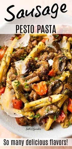 sausage pesto pasta on a white plate with the words, so many delicious flavors