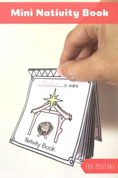 a hand holding up a mini nativity book with the text, free printable