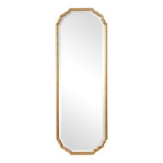 a gold framed mirror on a white wall