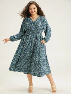 Ditsy Floral Wrap Shirred Pocket Lantern Sleeve Dress – BloomChic Long Sleeve Floral Dress For Casual Occasions, Casual V-neck Dress With Ditsy Floral Print, Casual Fall Floral Print Dress, Casual Floral Print Dress For Fall, Casual Long Sleeve Maxi Dress With Floral Print, Casual Patterned Floral Print Midi Dress, Casual Patterned Midi Dress With Floral Print, Casual Long Sleeve Patterned Midi Dress, Casual Long Sleeve Printed Dress