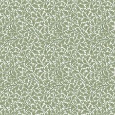 a green and white wallpaper with leaves