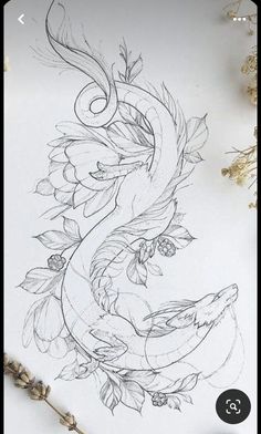 a drawing of a dragon with flowers and leaves on it's back, sitting next to some dried plants