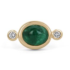 A magnificent emerald cabochon and diamond accent three-stone ring. This remarkable piece features a stunning, high-quality, dark emerald green cabochon emerald. Cut into the shape of an oval, with very good clarity and luster. The center stone is bezel set, with two brilliant round-cut diamonds accenting either side. Crafted in fabulous 14K yellow gold.  Setting Style: Bezel - Three Stone Setting Material: 14K Yellow Gold Setting Weight: 6.8 Grams Main Stone: Emerald Cut: Cabochon Shape: Oval Cut Weight: 4.36-Carats Clarity: Transparent Color: Dark Green Luster: Very Good Treatments: Natural, Oiling Origin: Zambia Secondary Stone: Diamond Weight: 0.14-Carats (Total) Cut: Brilliant Round Clarity: VS2 Color: I Luster: Very Good Treatments: Natural Estimated Retail Value: $12,590.00 USD Keep Fine Jewelry Emerald Oval Cabochon Ring, Fine Jewelry Emerald Ring With Oval Cabochon, Fine Jewelry Emerald Diamond Cabochon Ring, Yellow Gold Emerald Ring Oval Cabochon, Yellow Gold Emerald Ring With Oval Cabochon, Anniversary Diamond Cabochon, Fine Jewelry White Gold Cabochon Emerald Ring, Fine Jewelry White Gold Emerald Cabochon Ring, White Gold Cabochon Emerald Ring Fine Jewelry