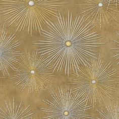 an artistic wallpaper with gold and white starbursts on brown paper background