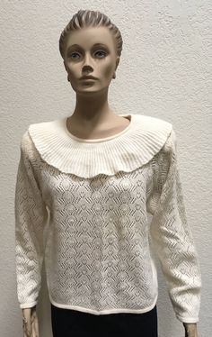 Vintage Sweater Leau Vive Lambswool Blend White Pullover Winter Blouse Career Casual Back to School New Soft and pretty off white sweater has shoulder pads and a large portrait collar. Sweater is new with tags.  Size Large approximate measurements  Bust underarm to underarm-40 inches  Length shoulder to hem- 23 inches  Made in Hong Kong  70% Lambswool 20% Angora Rabbit Hair 10% Nylon  Dry Clean Only  Always willing to consider reasonable offers! My environment is smoke free and pet free but I ca Classic White Pointelle Knit Sweater, Cream Knit Retro Top, Retro Cream Knit Tops, Cream Retro Knit Top, Vintage Knitted Beige Tops, Vintage Beige Knitted Tops, Vintage Cream Knit Tops, Vintage White Knitted Tops, White Vintage Knitted Top