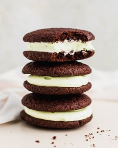 a stack of cookies with ice cream on top