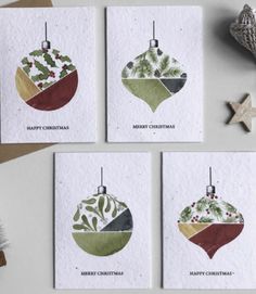 four christmas cards with different ornaments on them