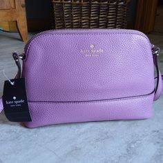 **New** $250 Kate Spade Hanna Pebbled Leather Valerian Southport Ave Crossbody Bag! Gold Hardware With A Beautiful Purple Pebbled Leather Material. Sold Out Online. - Approx Size 9 1/2" Wide X 6 1/4" High X 3" - Pebbled Leather - Beautiful Lavender Purple Color - Zip Top Closure - Goldtone Hardware - Adjustable Strap With 22" Drop - Classic Spade Fabric Lining - Inside Slip Pocket Feel Free To Message Me With Any Questions! Bundle Up To Save!!! Check Out My Closet For More Items! Elegant Crossbody Bag With Pebbled Texture, Kate Spade Textured Leather Crossbody Bag, Lavender Purple Color, Valerian, Lavender Purple, Kate Spade Bag, Zip Top, Leather Material, Kate Spade New York