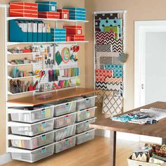 an organized craft room with lots of storage