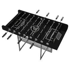 an image of a foosball table that is black and white