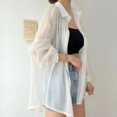 Elevate your summer wardrobe with our Sheer Summer Solid Blouse. Crafted from a luxurious cotton and polyester blend and featuring a light and airy broadcloth fabric, this LOOSE FIT blouse is perfect for warm weather. The elegant turn-down collar and single breasted closure add a sophisticated touch, while the sheer decoration adds a hint of allure. With slight stretch and a regular length, this blouse is both comfortable and stylish. Product Details Fabric Type: Broadcloth Pattern Type: Solid Fit Type: LOOSE FIT Thickness: Thin Clothing Length: Regular Material: Cotton/Polyester Elasticity: Slight Stretch Decoration: Sheer Sleeve Length(cm): Full Collar: Turn-down Collar Closure Type: Single Breasted Loose Fit Blouse, Clothes Korean Style, Chic Shirts, Summer Cardigan, Ali Express, Shirts Women, Summer Fabrics, Sheer Sleeves, Summer Shirts