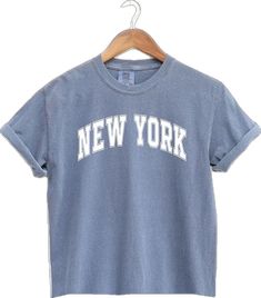 Light Wash Crew Neck T-shirt With Letter Print, Trendy Light Wash Soft-washed Top, Trendy Faded Soft-washed T-shirt, Faded Casual Summer T-shirt, Faded Casual T-shirt For Summer, Casual T-shirt For Summer, Casual Medium Wash T-shirt For Summer, Basic Acid Wash Summer T-shirt, Summer Washed Blue Cotton T-shirt