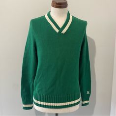 Nwt, Never Worn. 100% Cotton. Leather- Like Elbow Patches. Cotton V-neck Sweater For College, Green V-neck Top With Ribbed Cuffs, Classic Green V-neck Long Sleeve Sweater, Retro Green V-neck Sweater, Classic Green Long Sleeve V-neck Sweater, Preppy Cotton V-neck Sweater, Green Varsity Sweater For Winter, Cotton V-neck College Sweater, Sporty Cotton V-neck Sweater