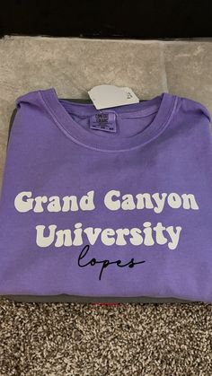 Comfort colors Grand Canyon University Tee Trendy Pre-shrunk Shirt For College, Collegiate Purple Cotton Tops, Purple Collegiate Cotton Tops, Casual College Shirt With Screen Print, Purple Cotton Collegiate Tops, Trendy Cotton Shirt For College, Collegiate Style Screen Printed Tops, Collegiate Style Screen Print Tops For Campus, Collegiate Screen Print Top For Campus