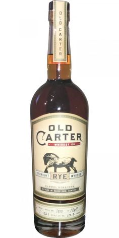 an old cartter rye whiskey bottle on a white background