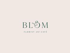 the logo for bloom florist and cafe, which has been designed by person