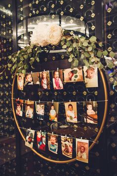 a display case with pictures and flowers on it