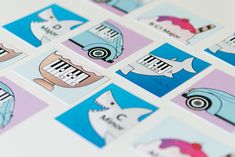 several stickers with different pictures of cars and animals on them, all in blue and pink