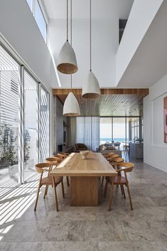 a large wooden table sitting in the middle of a room