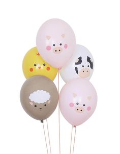 a bunch of balloons with farm animals on them