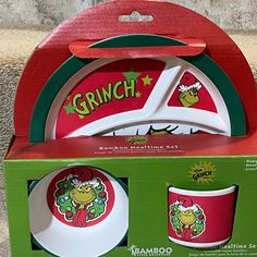 the grinch dinnerware set is in its box and ready to be bought for christmas