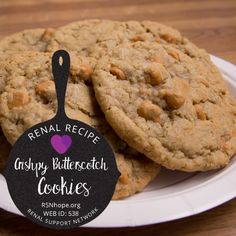 some cookies are on a plate with a tag