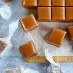 several pieces of caramel soap on a cutting board