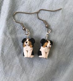 pair of dog earrings with black and brown ears